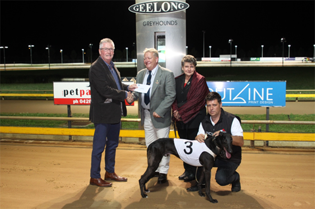 Geelong Greyhound Racing Club Chairman, Mark Pearson, presenting a $1,000 donation to Geelong RSL Senior Vice President, Glenn Agnew and his wife Denise, with Handler Brendan Pursell looking on. Race 8 winner was Scooby Who, trained by R Britton.