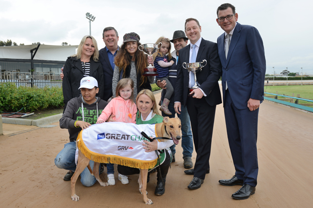 Autism Plus Disability support worker, Carmel Grogan and Anthony Tran. Inset: Despacito with (from left) TAB’s Adam Rytenskild, Sophie and Seona Thompson and Premier Daniel Andrews.