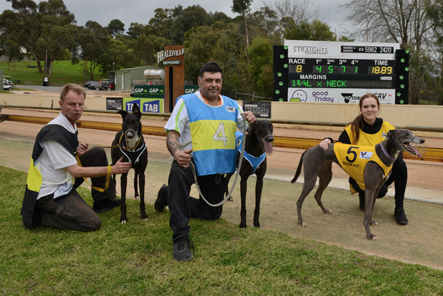 Healesville Cup placegetters Swift Rain, Kouta Mayhem and Zoom Out with their respective catchers immediately after the race.