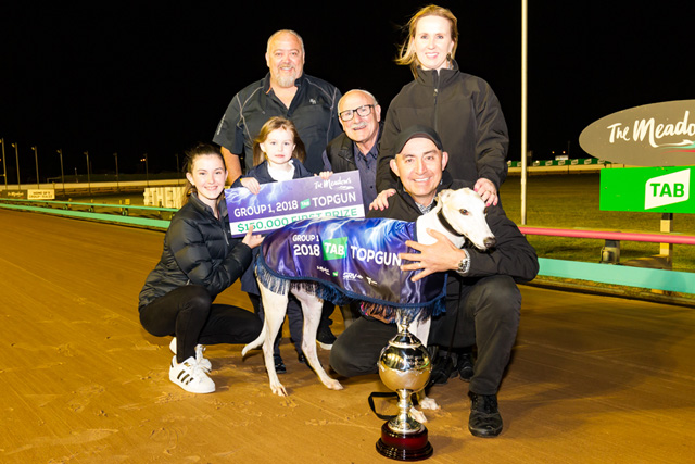 Poke The Bear with connections (from left) Holly and Sophie Thompson, Darren and Michael Puleio, Jason and Seona Thompson and the TAB Topgun trophy.