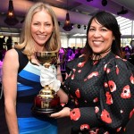 MC Tiffany Cherry and Kate Ceberano with the TAB Melbourne Cup trophy.