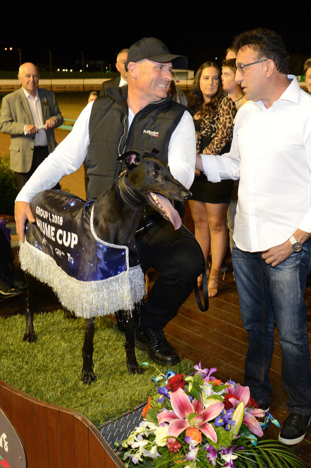 Glenn Dainton (left) and Joe Borg share a moment after their Hume Cup success.