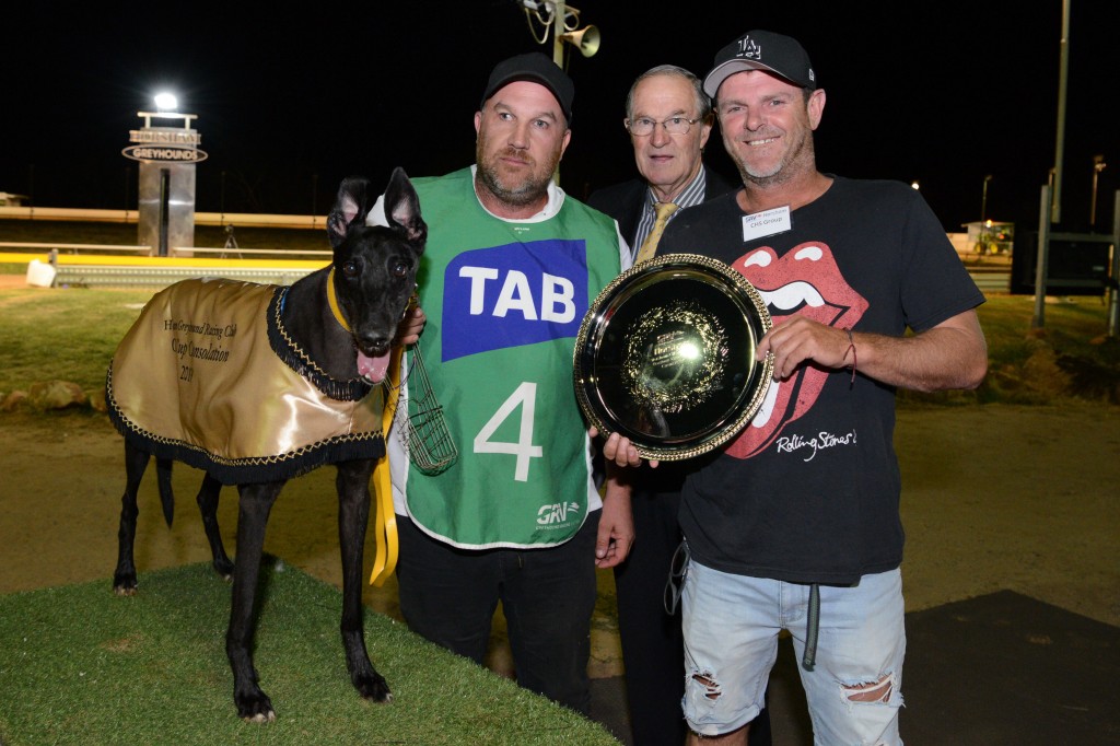 Major Riot at the presentation of the Horsham Cup Consolation with handler Paul Abela, Horsham GRC President Ian Bibby and Chris Hopper of sponsor CHS Group.