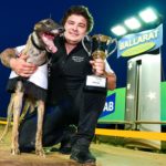 Yozo Bale with trainer Correy Grenfell and the prized Ballarat Cup trophy.