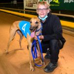 Zipping Zarbo with handler Ricky Coleman.