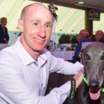 Champion WA jockey Willie Pike, part of the Tommy Shelby entourage, with a greyhound from GAP.