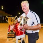 Ferdinand Boy with trainer David Geall and the prized Shepparton Cup trophy.