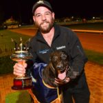 Qwara Bale with handler Josh Formosa and the prized Sapphire Crown trophy.