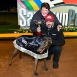 Zipping Rambo with Mark and Lisa Delbridge and the RSN Sandown Cup trophy.