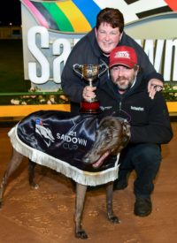 Zipping Rambo with Mark and Lisa Delbridge and the RSN Sandown Cup trophy.
