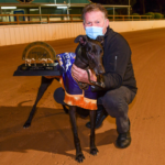 Aston Rupee with trainer Glenn Rounds after taking out the 525m Speed Star.