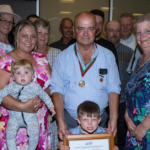 Murray Collyer with family and friends